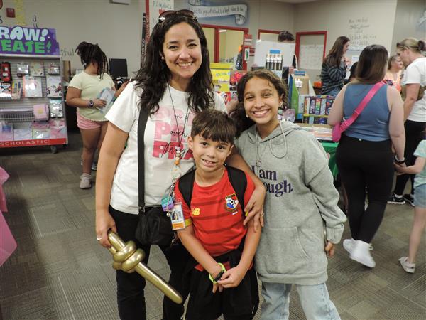 family in library